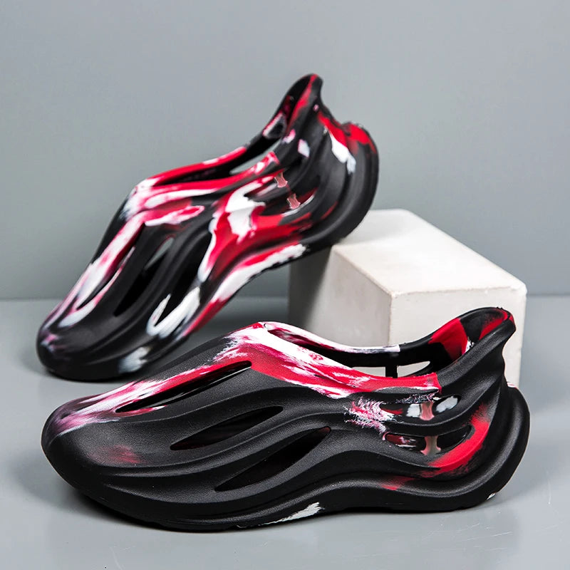 Men's summer camouflage Yeezy - style clogs, suitable for outdoor wear, with a closed - toe and slip - on one - strap design.